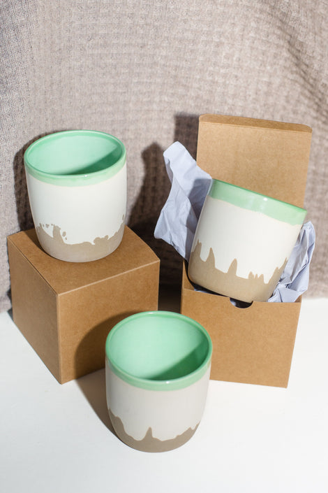 Photo of three of the LA mugs styled together.