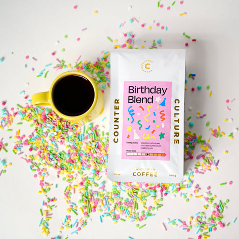 Counter Culture Coffee Birthday Blend package with a coffee cup and colorful sprinkles on a light background